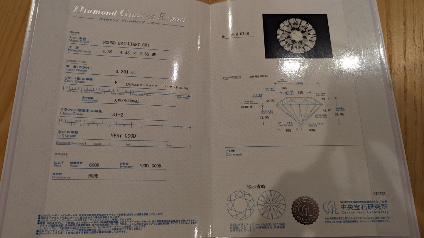 PT・センター0.626ct + メレ0.27ct(ハート&キューピッド) ダイヤモンド取り巻き/ヘイローピアス COLORLESS