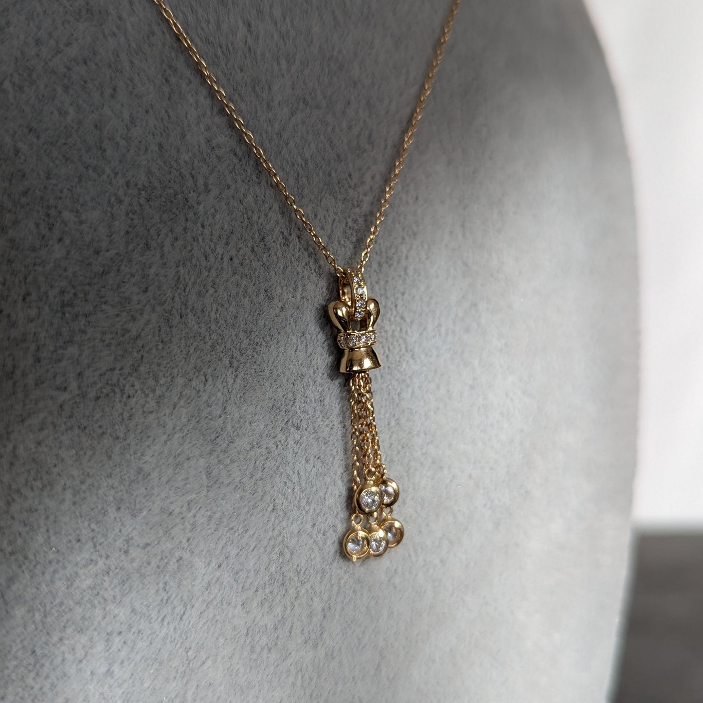 4. ダイヤモンドタッセルネックレス YG 0.33ct