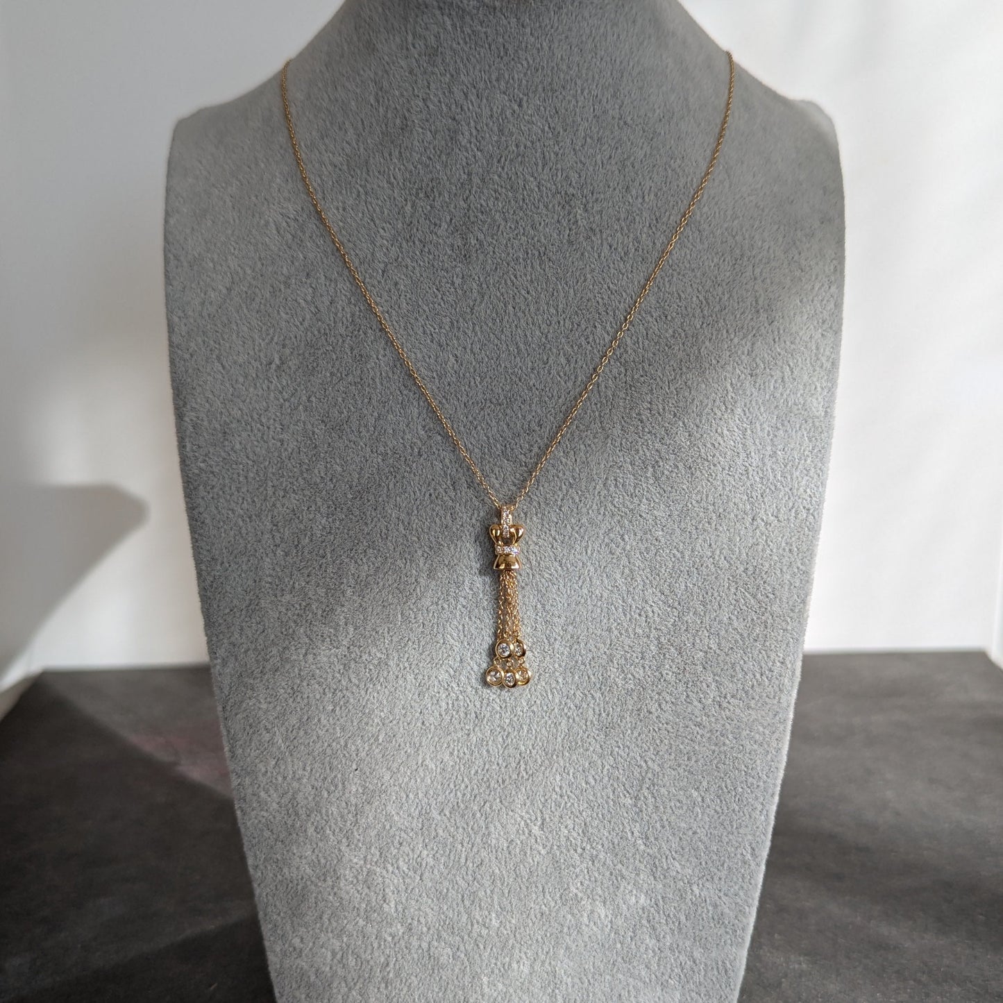 4. ダイヤモンドタッセルネックレス YG 0.33ct