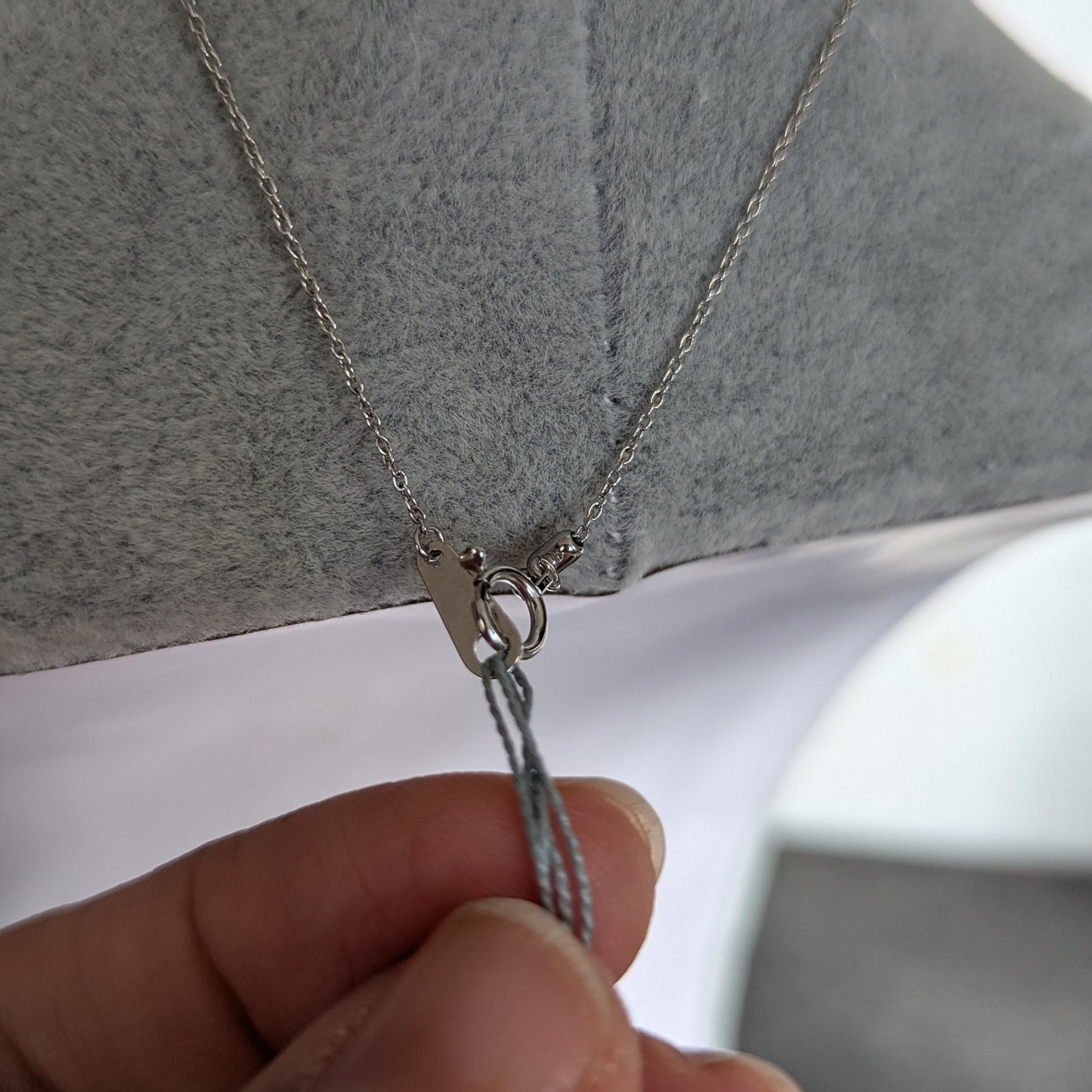 3. ダイヤモンドタッセルネックレス WG 0.6ct